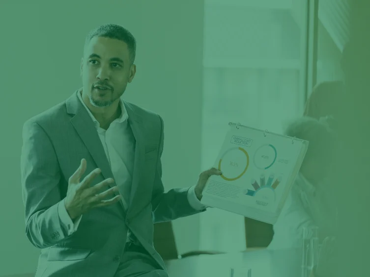 male professional gives presentation on financial topic